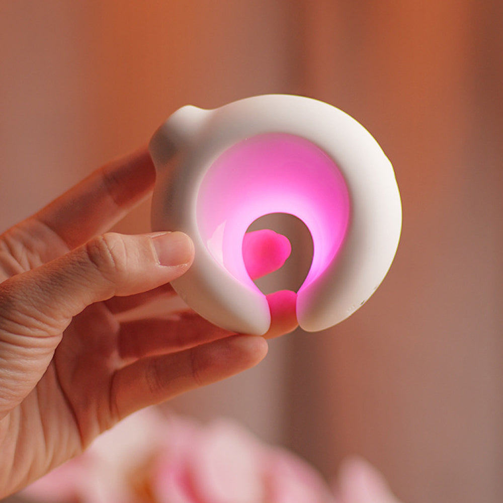 Luminous clitoral sucking vibrator