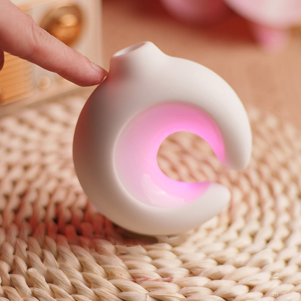 Luminous clitoral sucking vibrator