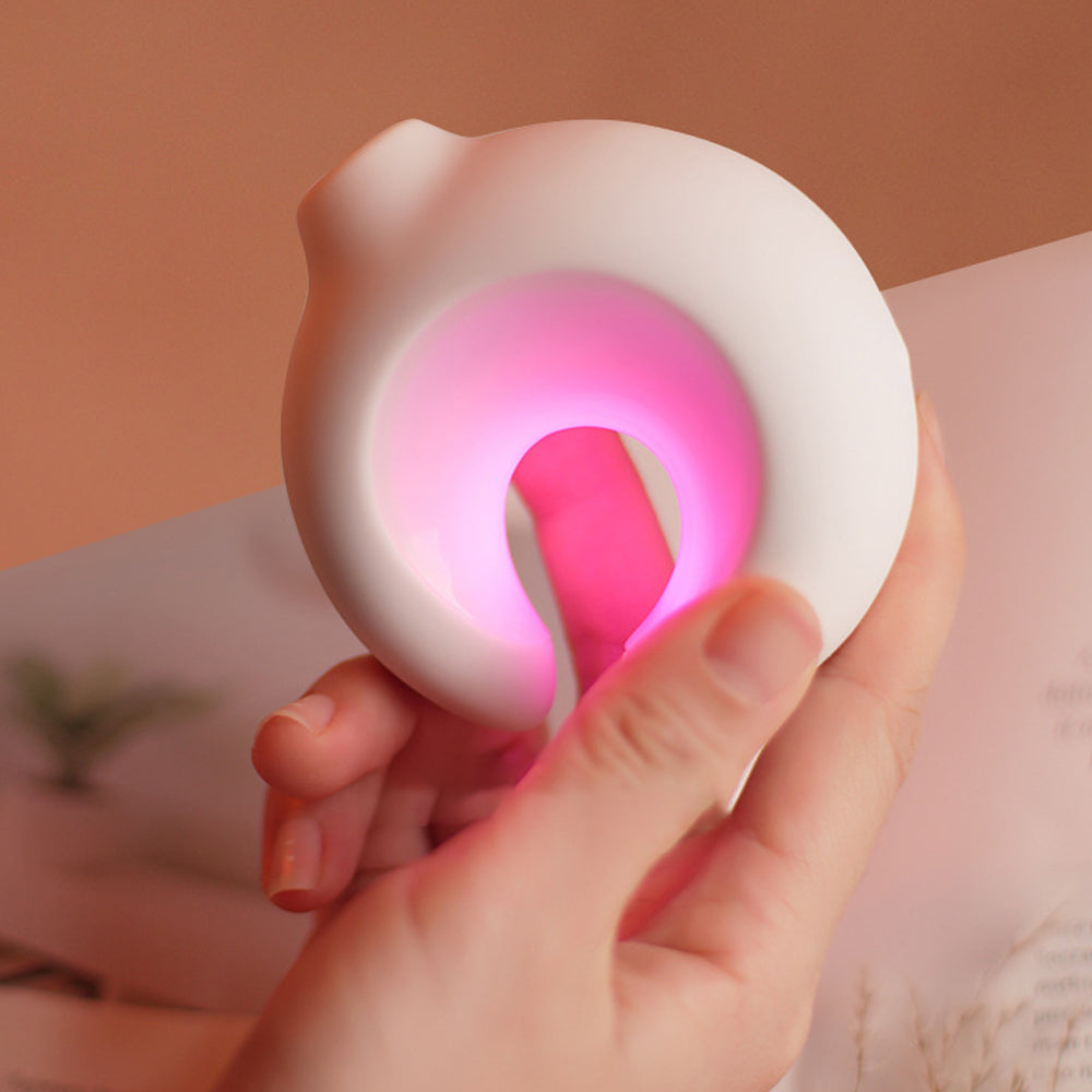 Luminous clitoral sucking vibrator