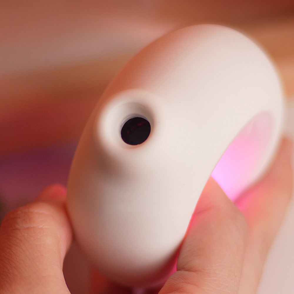Luminous clitoral sucking vibrator